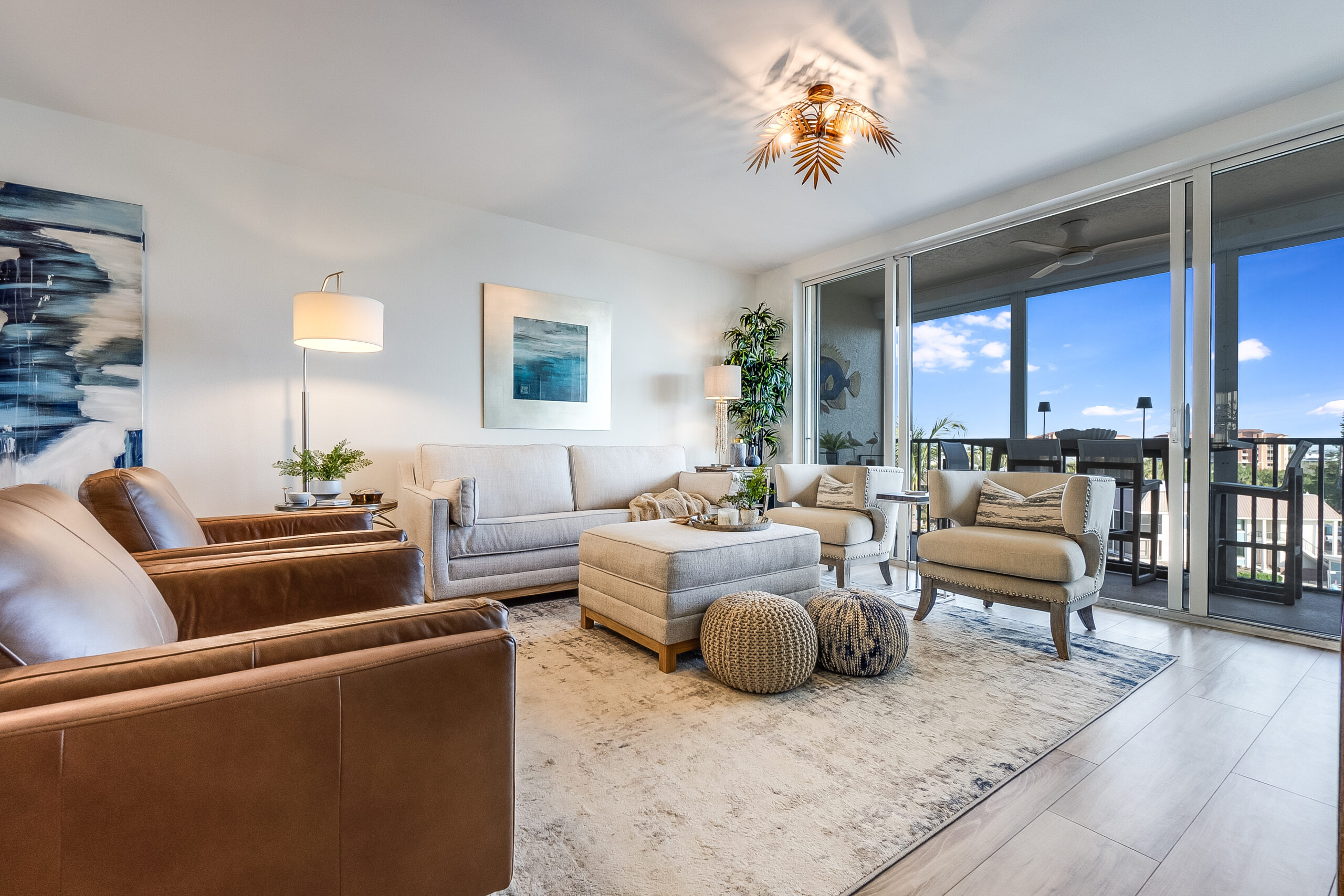 Staged coastal home in Southwest Florida living room overlooking ocean in bonita springs