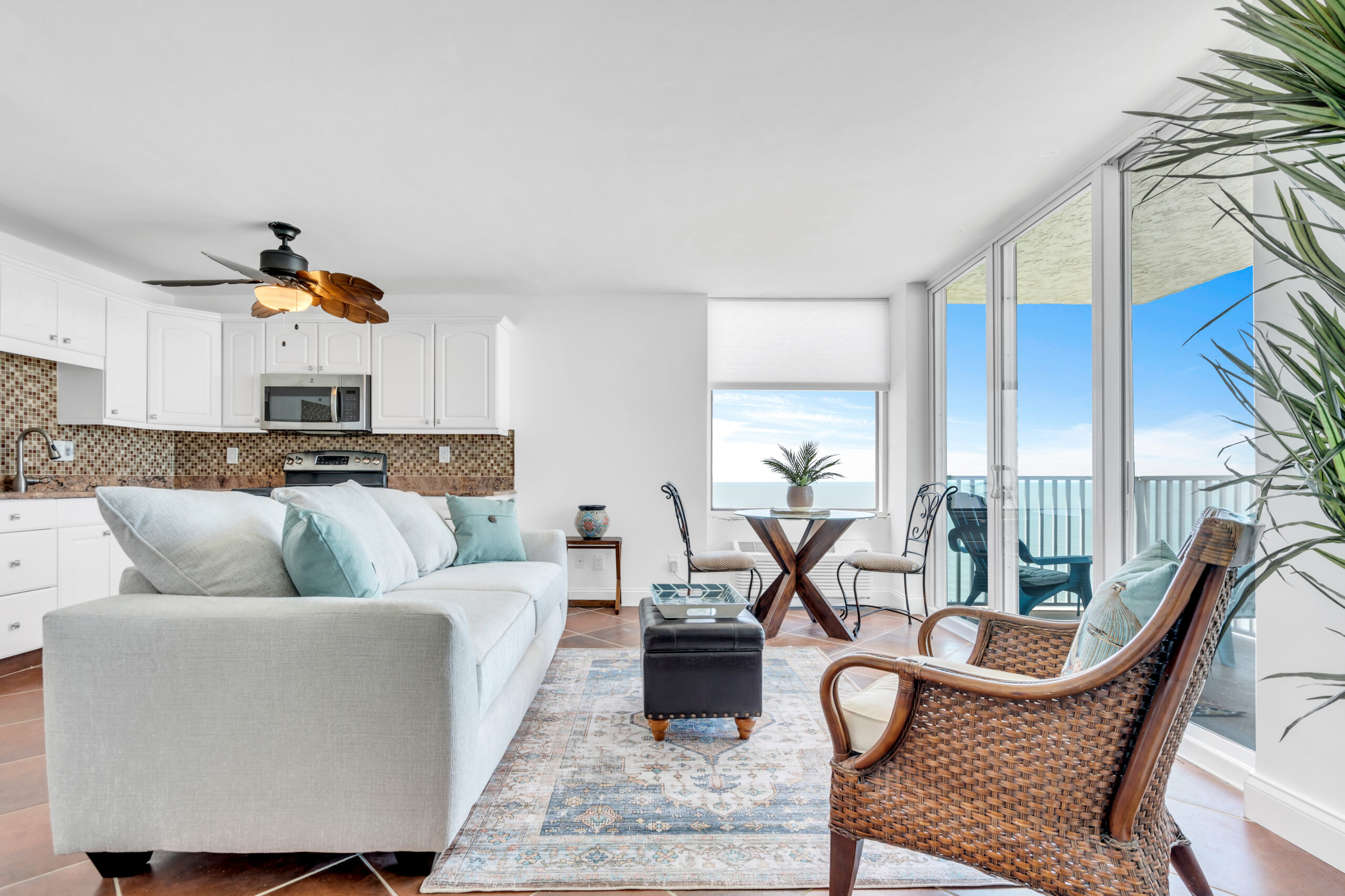 beautiful living room in SWFL beach condo sold with the real estate experts at The Jenny Beach Team in Fort Myers Florida